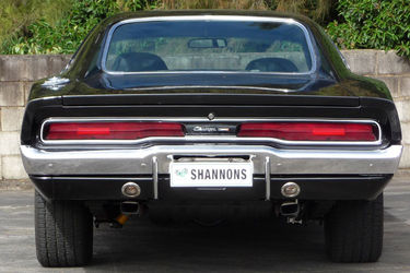 I know. I know. It’s only the backside, but the license plate is too funny! I have the link to the full picture below. 